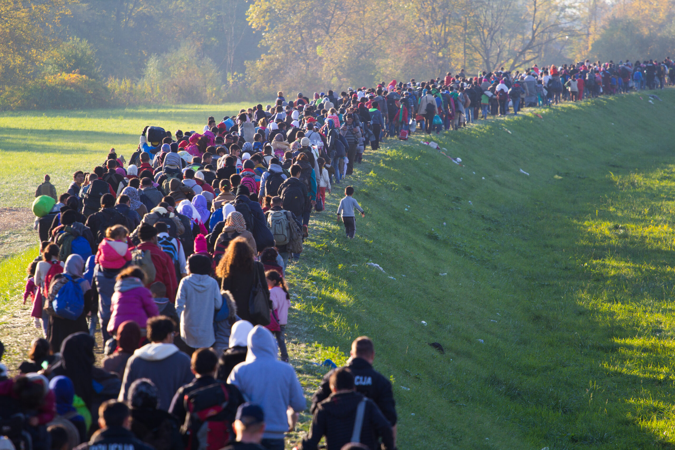 Several,Thousand,Refugees,Are,Wandering,Into,The,Direction,Of,Deutscland